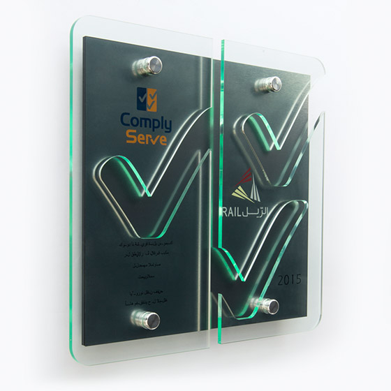 Corporate award - Twin layer glass effect acrylic plaque cut to bespoke shape of logo or design - green effect glass